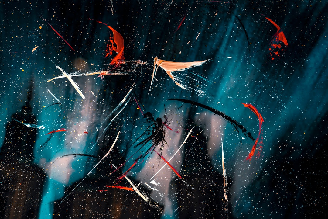 a painting of a sky with red and blue streaks