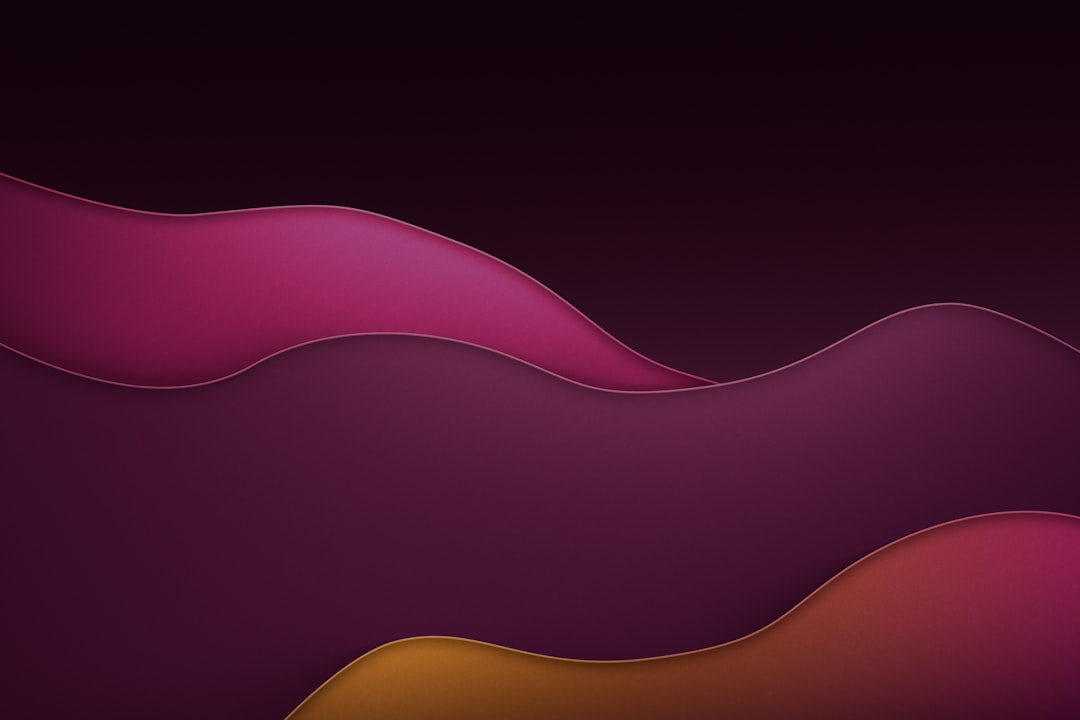 Abstract flowing shapes in deep purple and orange.
